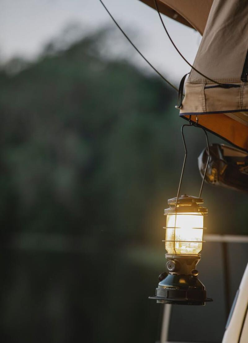 This may contain: a light that is on the side of a boat