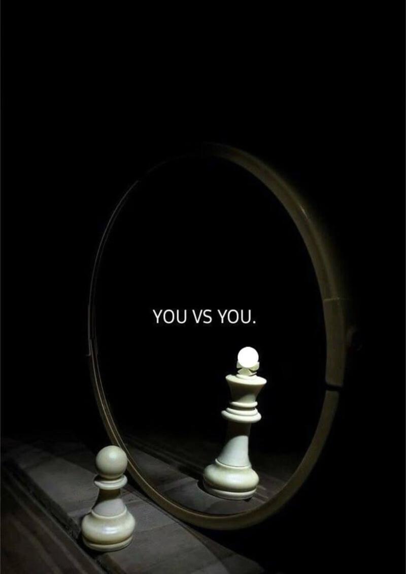 This may contain: a mirror with the words you vs you in front of it and chess pawns