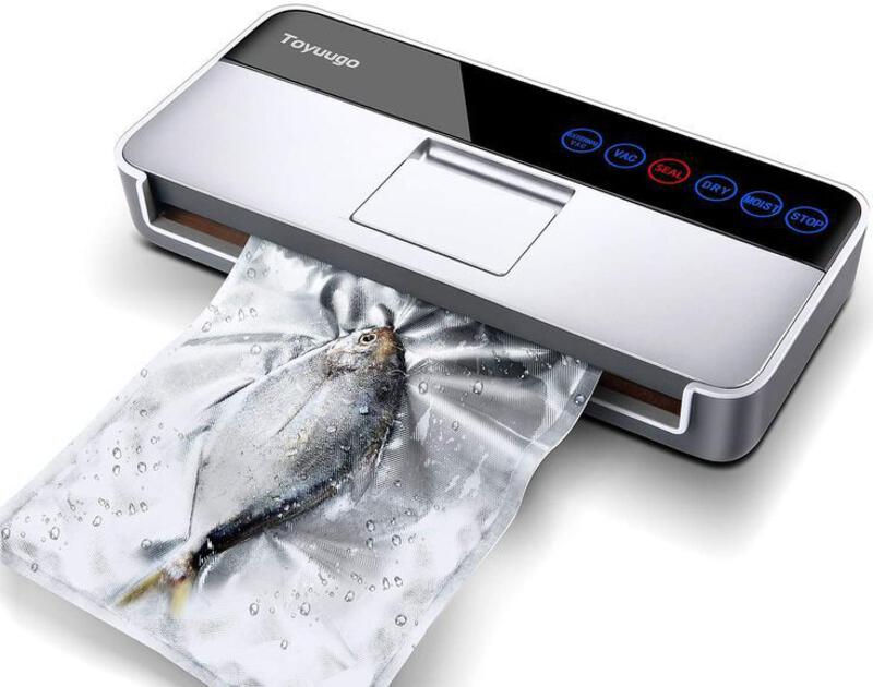 This may contain: an image of a fish on a sheet of paper under a printer machine that is open and ready to print