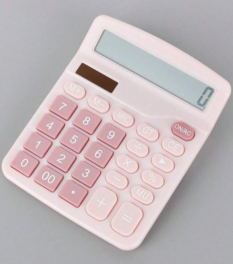 This may contain: a pink calculator sitting on top of a table