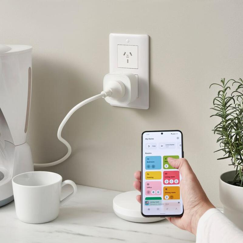 This may contain: someone is holding their phone and pluging in to the wall outlet with an appliance