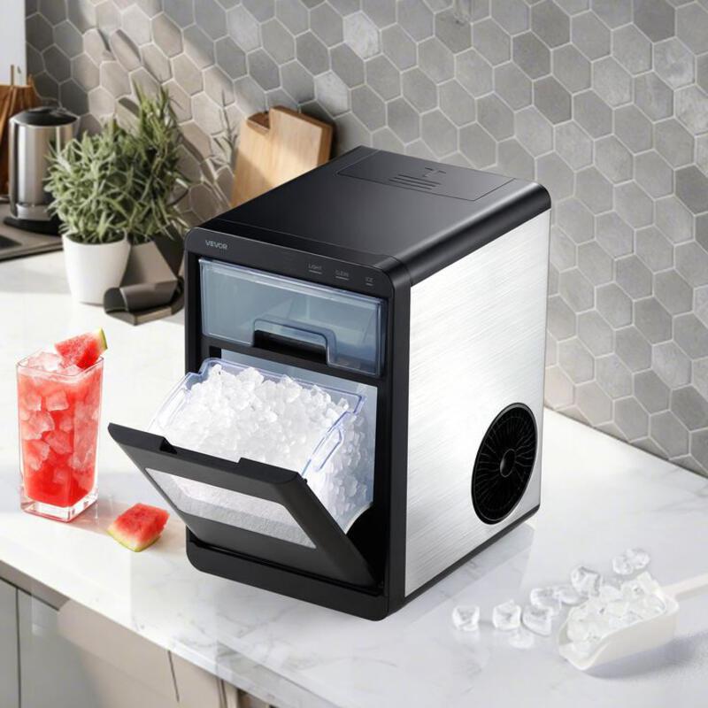 This may contain: a small ice maker sitting on top of a counter next to a glass filled with watermelon