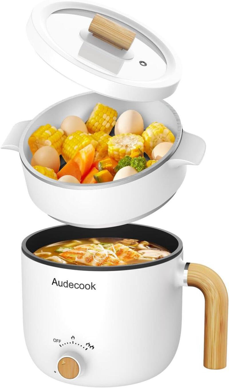 This may contain: an electric rice cooker with food in it
