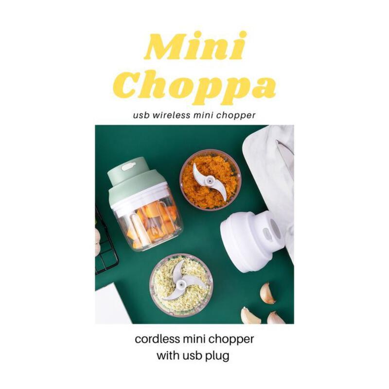 This may contain: an advertisement for the mini chopper is displayed on a green table with other food items