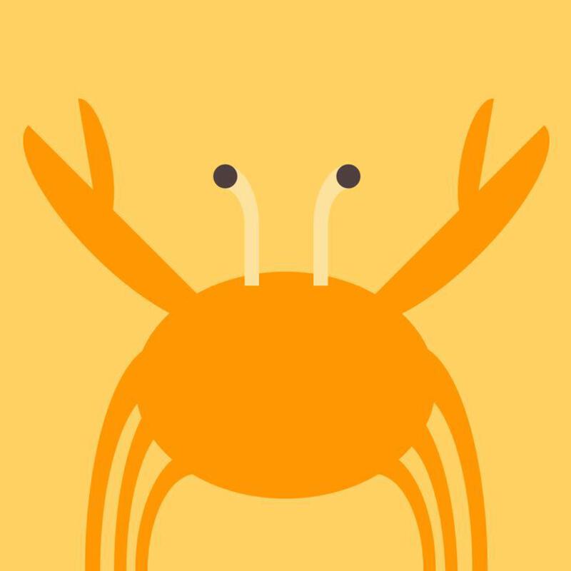 This may contain: an orange crab with two black eyes on it