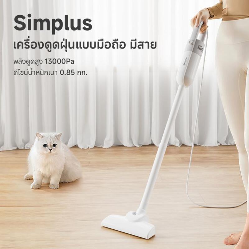 This may contain: a white cat sitting next to a woman with an electric mop on the floor