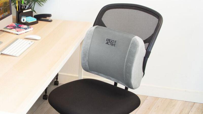 This may contain: an office chair sitting next to a desk with a computer monitor and keyboard on it